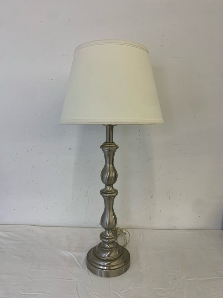 SILVER BASE LAMP W/ WHITE SHADE.