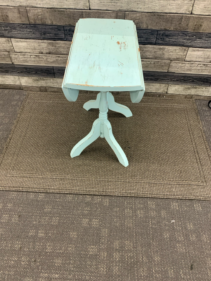 LIGHT BLUE OVAL DROP LEAF SIDE TABLE.