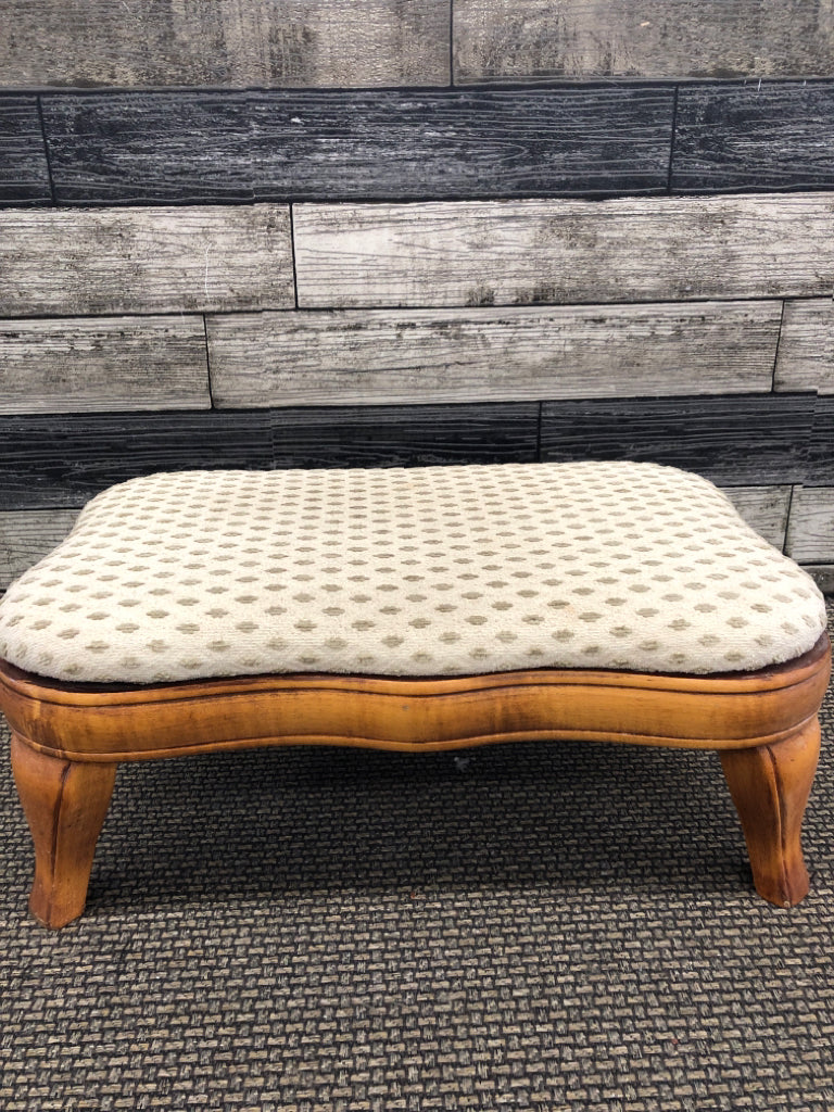 UPHOLSTERED WOOD FOOT STOOL.