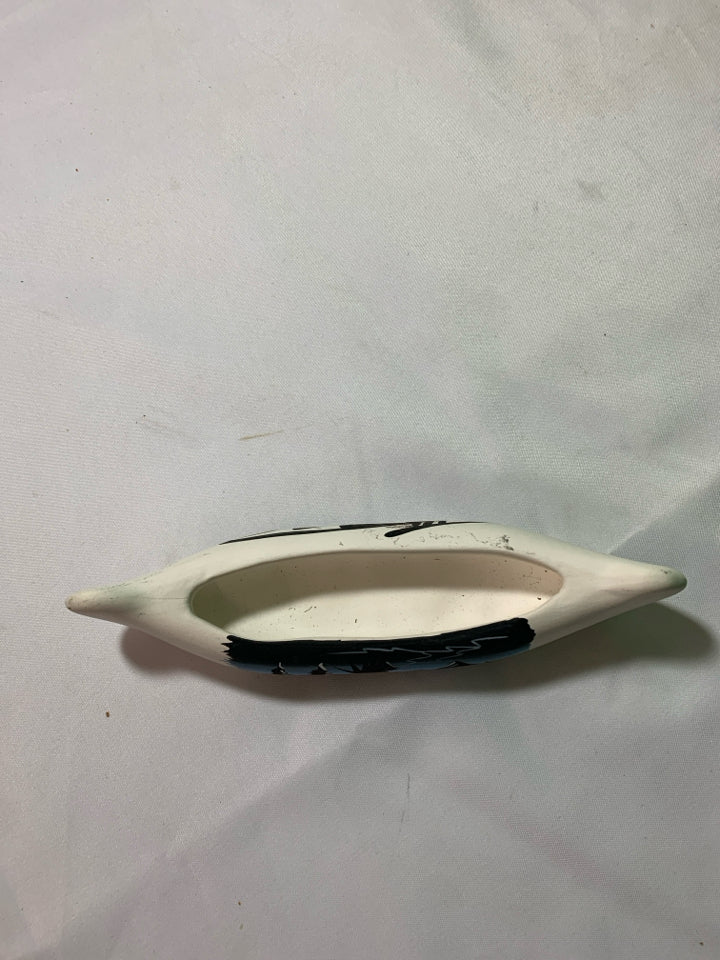 BLACK AND BLUE OVAL CANOE.