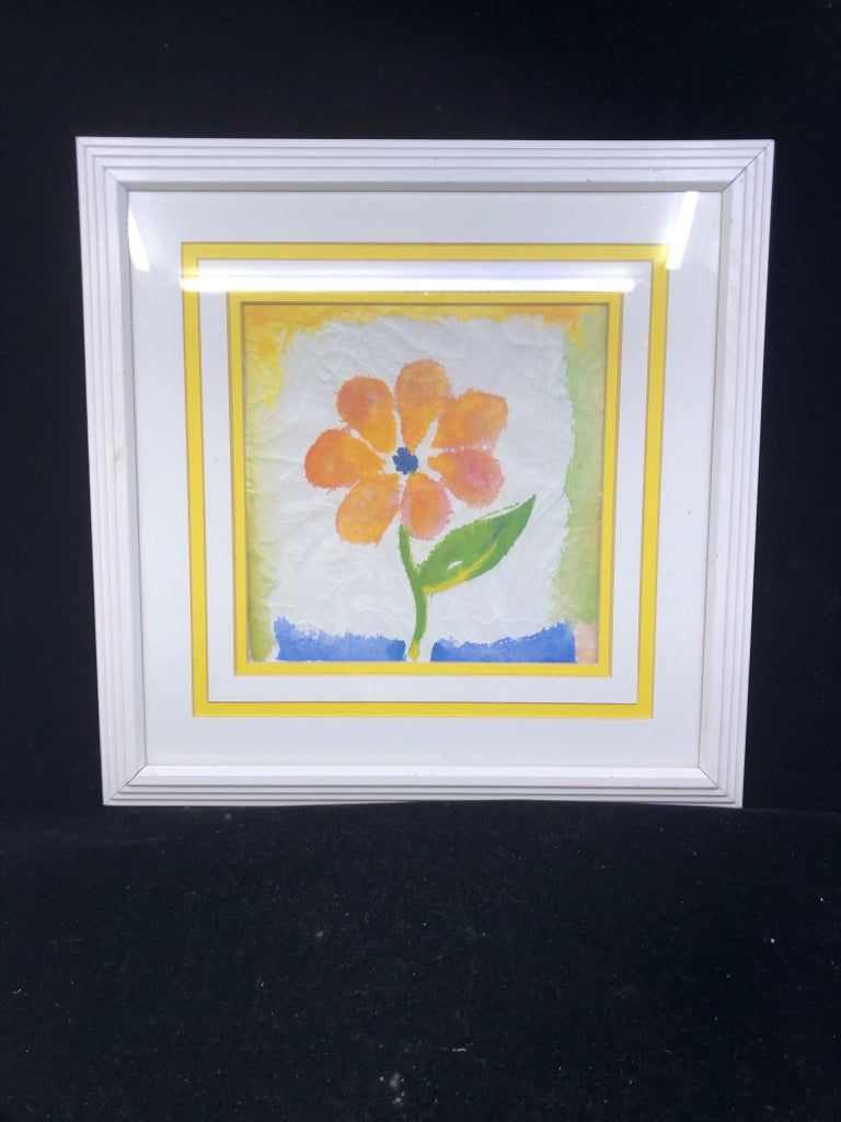 ORANGE FLORAL IN WHITE FRAME WALL HANGING.