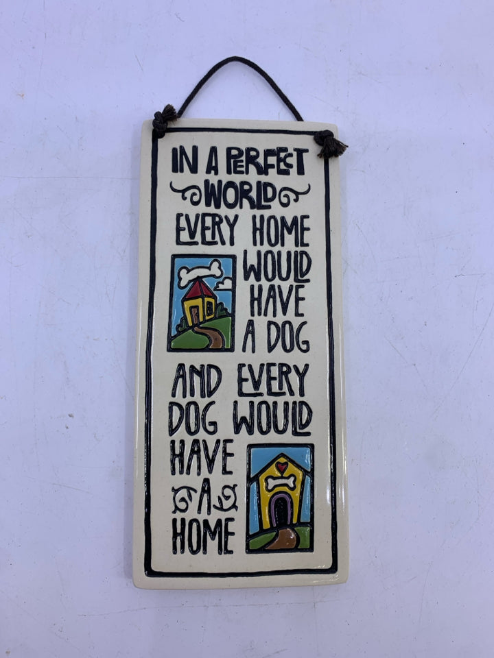 "IN A PERFECT WORLD" CERAMIC DOG HOME WALL HANGING.