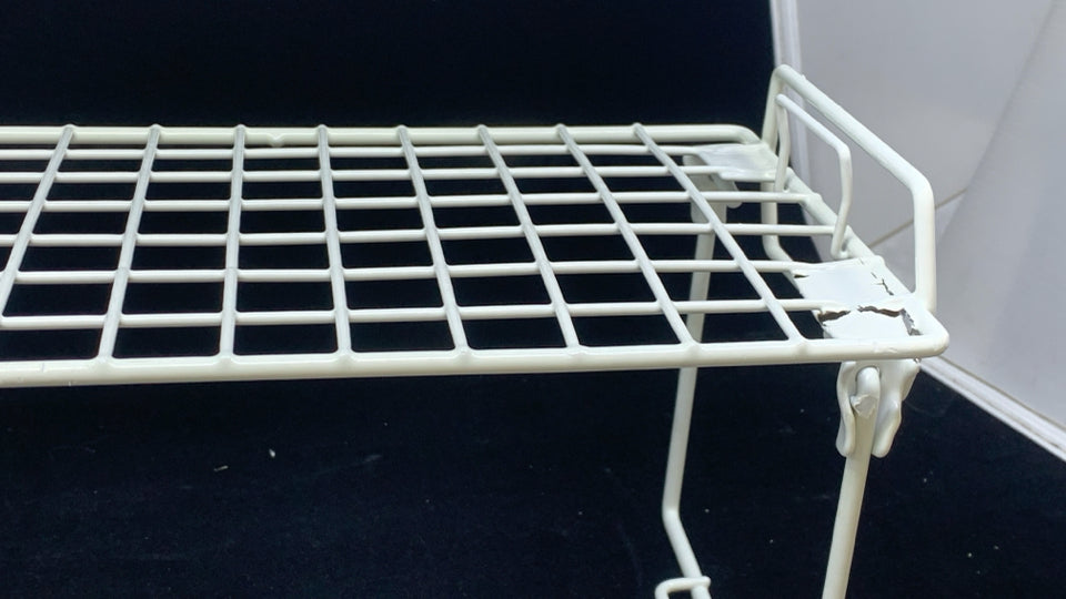 WHITE FOLDING WIRE RACK.