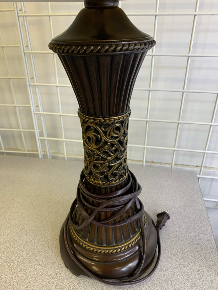 BROWN WOOD GOLD SWIRL TABLE LAMP WITH GOLD SWIRL SHADE.
