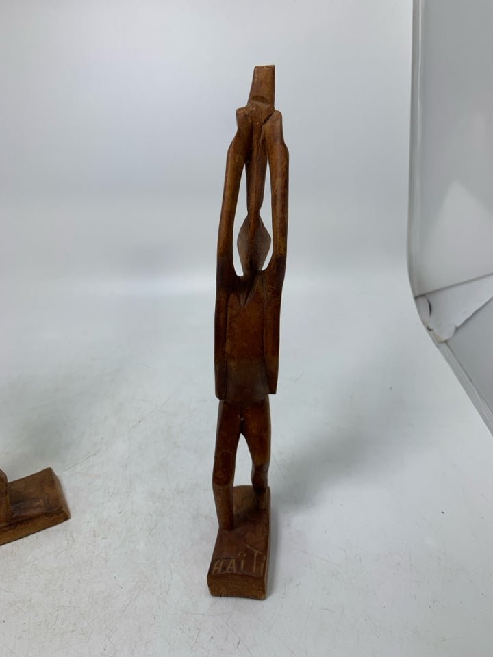 2 LIGHT WOOD CARVED FOLK ART MAN/WOMAN.