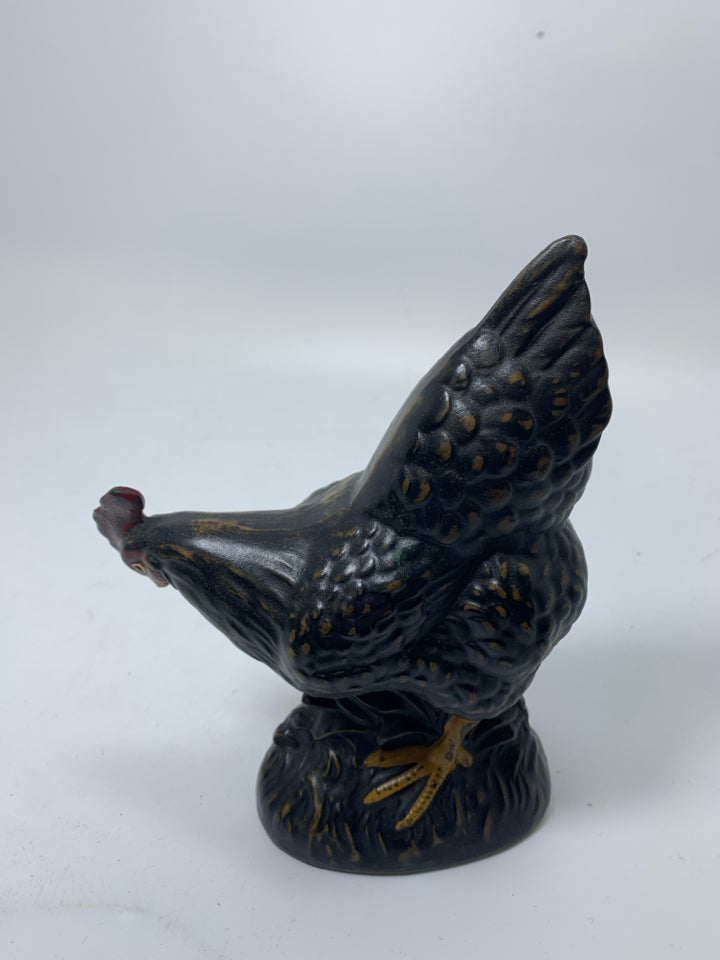 BLACK CHICKEN LOOKING DOWN RUSTIC.