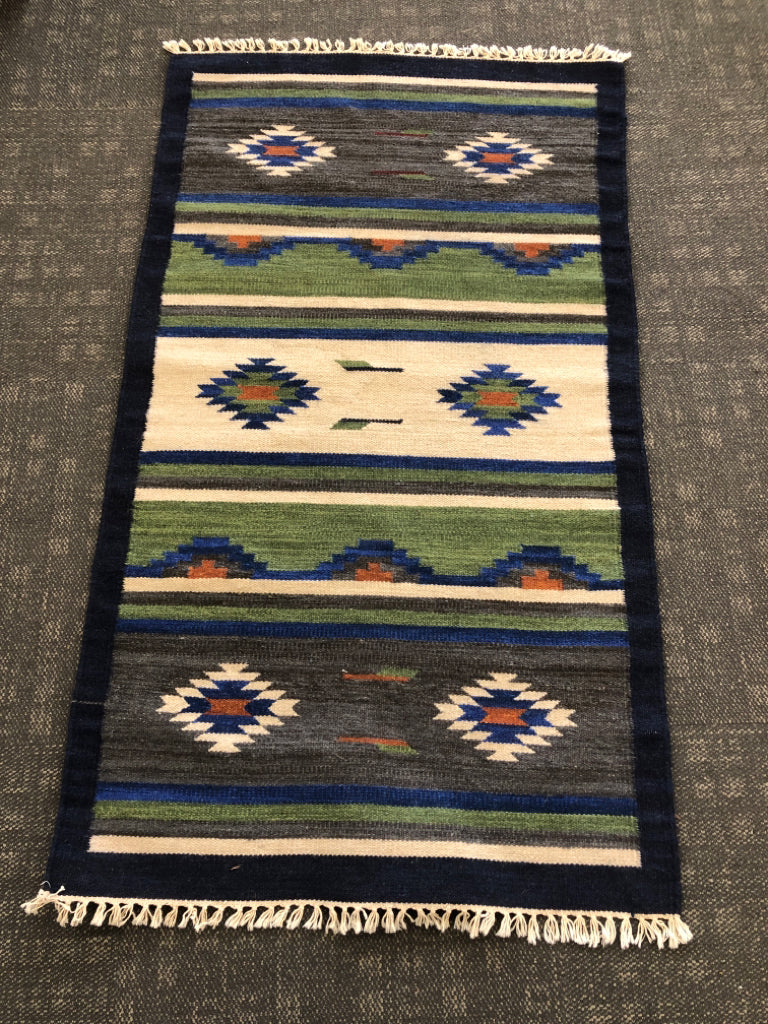 BLUE PATTERN KILIM RUG W/WHITE FRINGE.