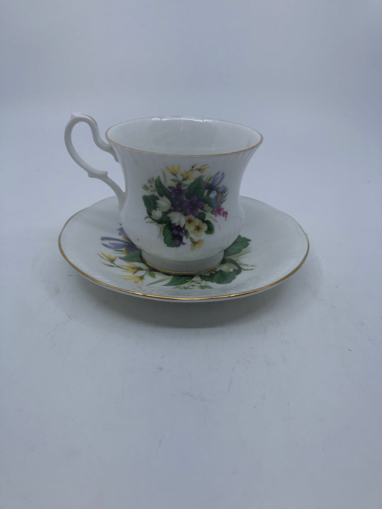 ROYAL VICTORIAN PURPLE AND WHITE FLORAL TEACUP AND SAUCER.