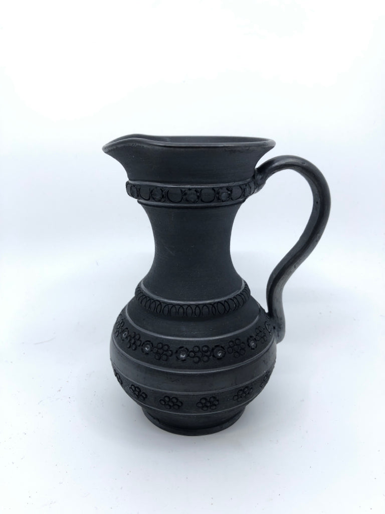 6PC BLACK CARVED TEA SET -PITCHER, CUPS W LID, SUGAR AND CREAMER ON PLATE.