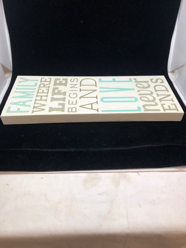 'FAMILY WHERE LIFE BEGINS' CANVAS SIGN.