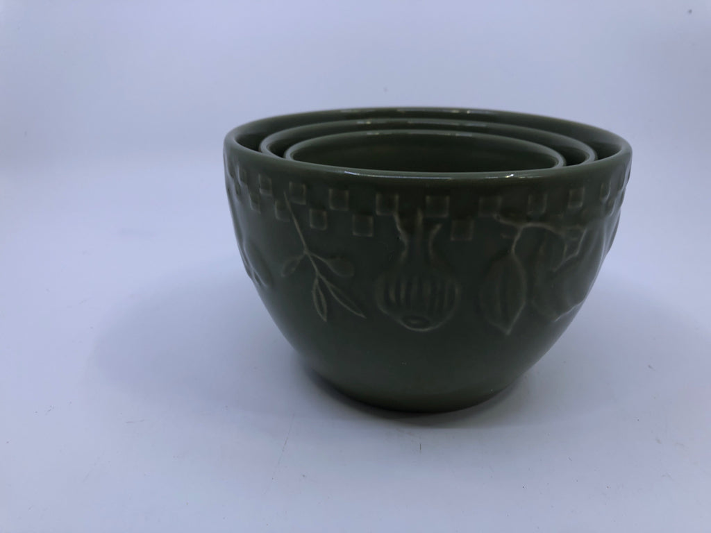 3 NESTING GREEN BOWLS W/ EMBOSSED FRUIT.