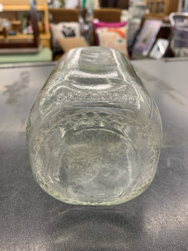 CLEAR MILK EMPTY BOTTLE.