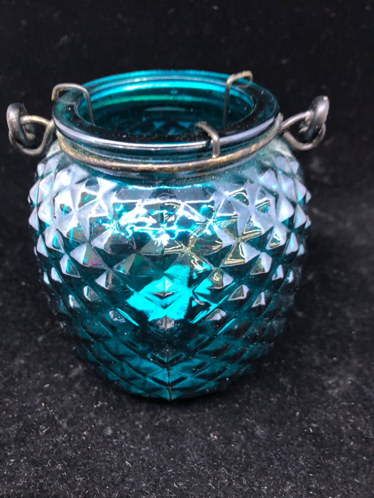TEAL GLASS LANTERN TEA LIGHT HOLDER.
