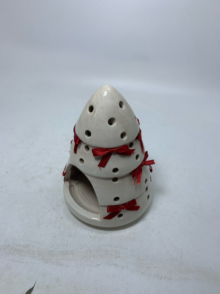 CREAM PIERCED CHRISTMAS TREE W/ RED BOWS TEALIGHT HOLDER.