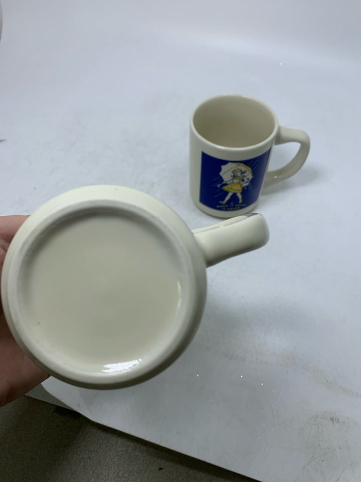 2 VTG WHEN IT RAINS IT POUR SALT MUGS.