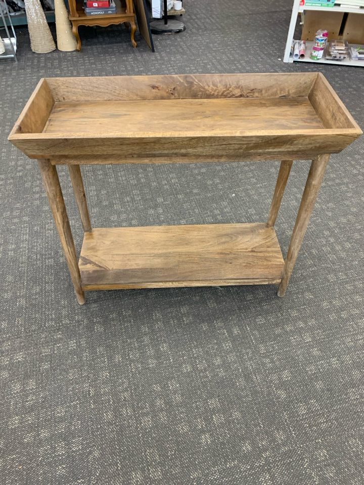BROWN DISTRESSED WOOD TRAY TABLE.