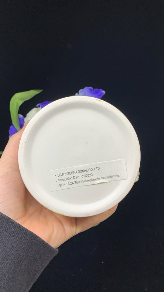 FAUX BLUE IRIS & WHITE CARNATION ARRANGEMENT.