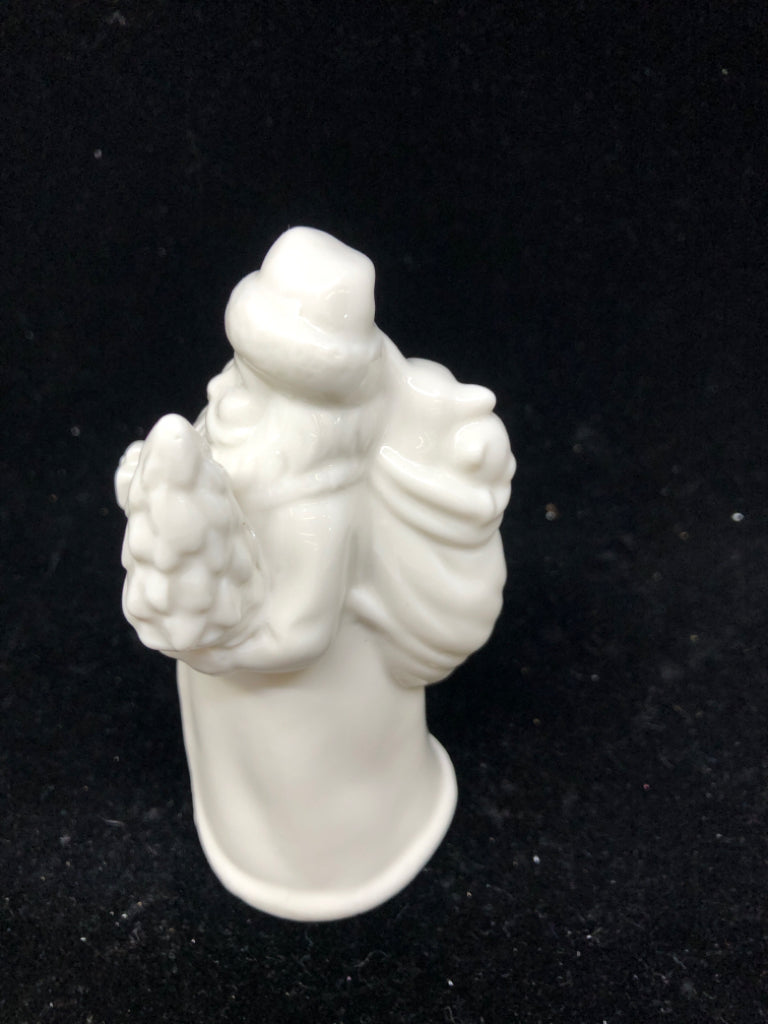 WHITE CERAMIC SANTA FIGURINE.