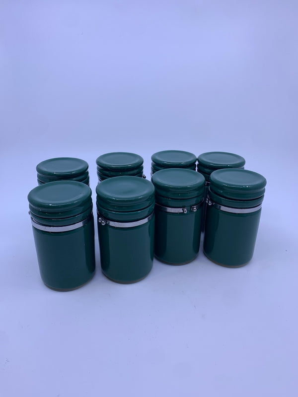 8 GREEN SPICE CANISTERS.
