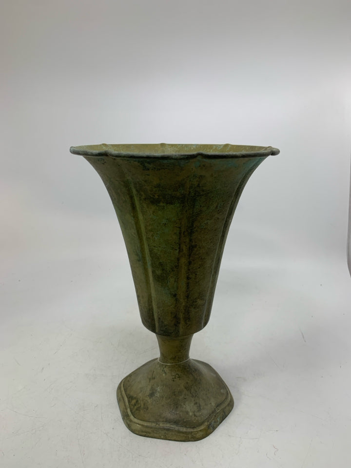 DISTRESSED FOOTED GREEN METAL VASE.