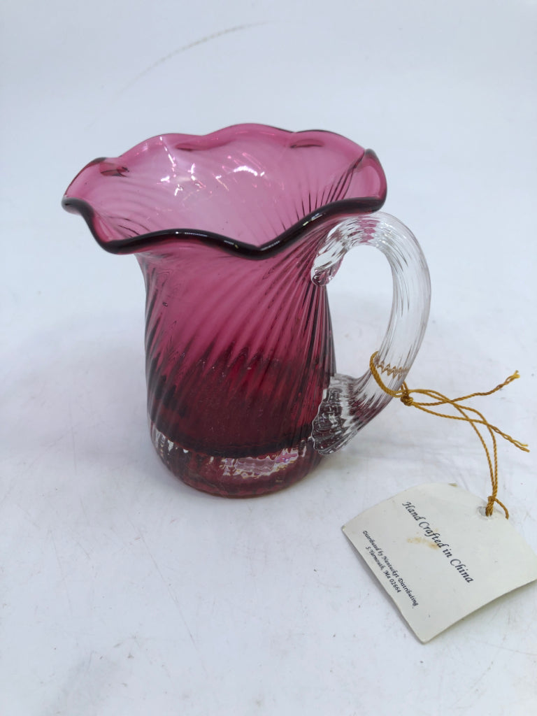 SMALL CRANBERRY GLASS PITCHER.