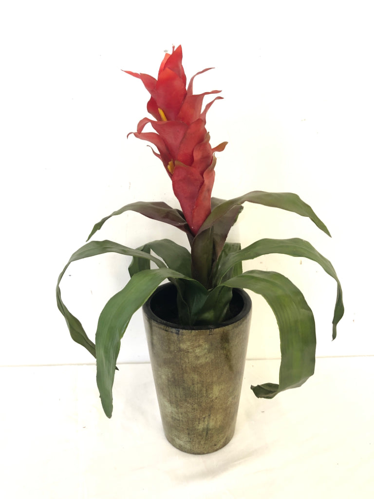 FAUX RED GUZMANIA IN BROWN PLANTER.