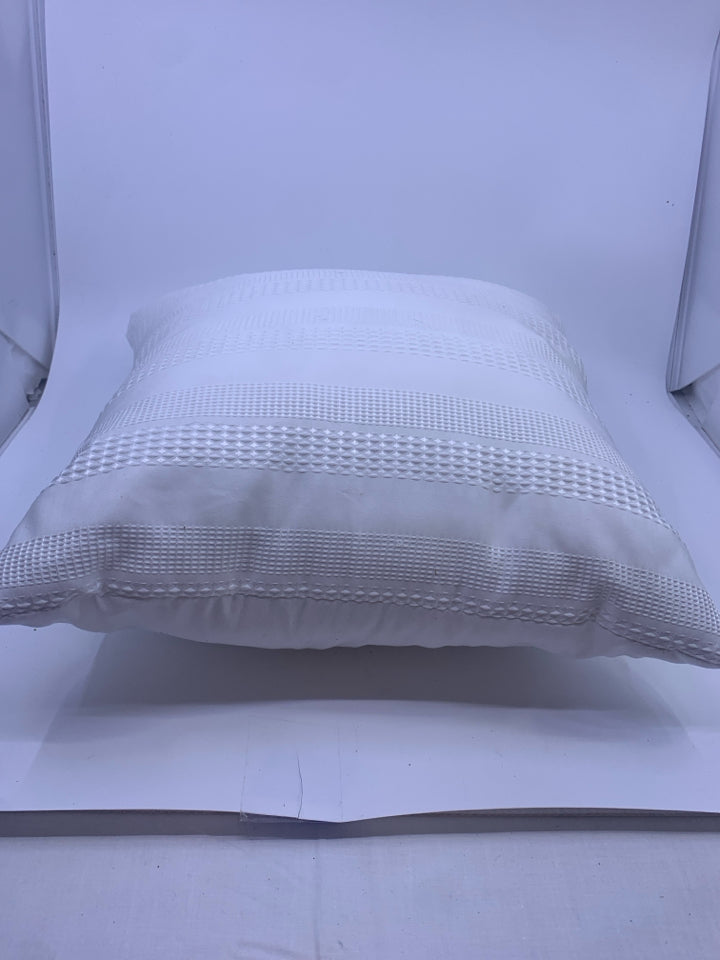 WHITE ACCENT PILLOW DIAMOND DESIGN.