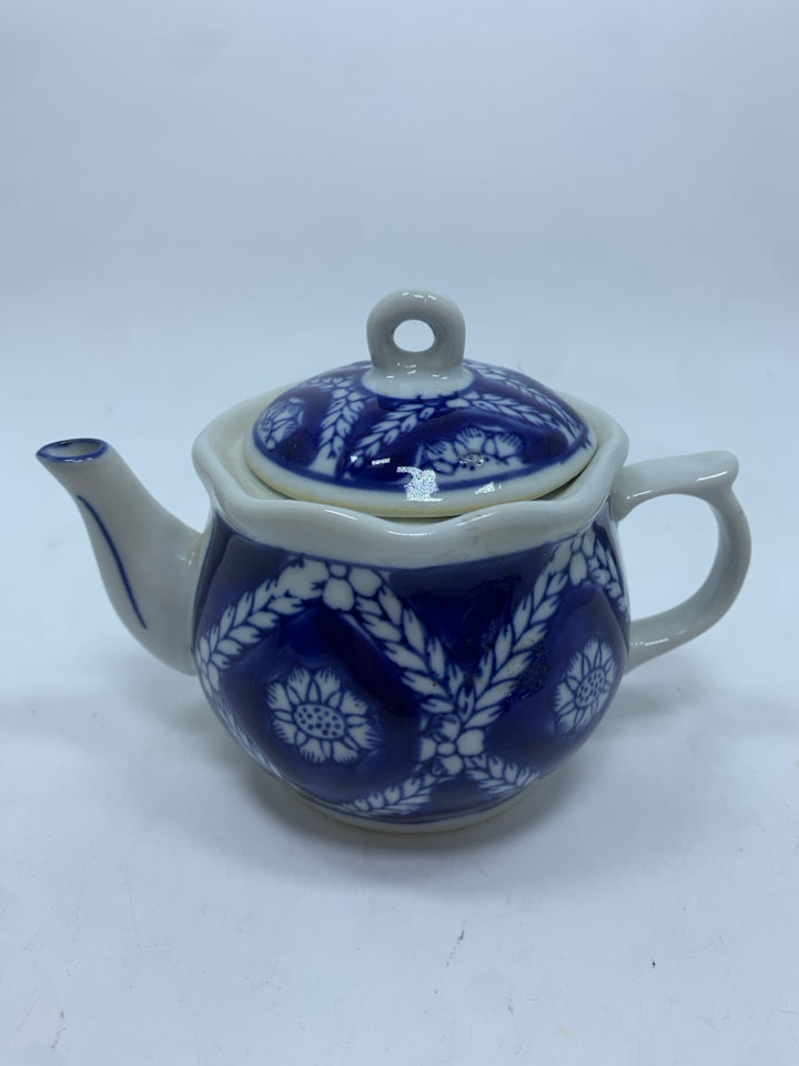 COBALT BLUE TEAPOT W/LEAF PATTERN.