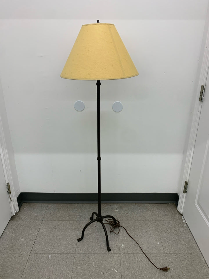 SKINNY BASE FLOOR LAMP W TAN SHADE.