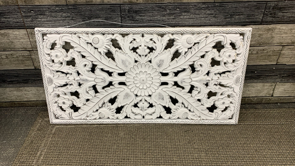DISTRESSED WHITE CARVED WOODEN FLORAL PANEL.