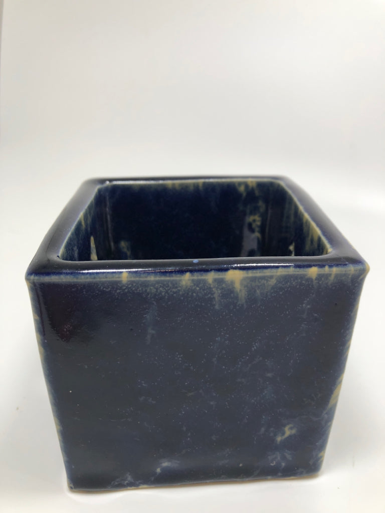 HEART CUT-OUT VOTIVE HOLDER.