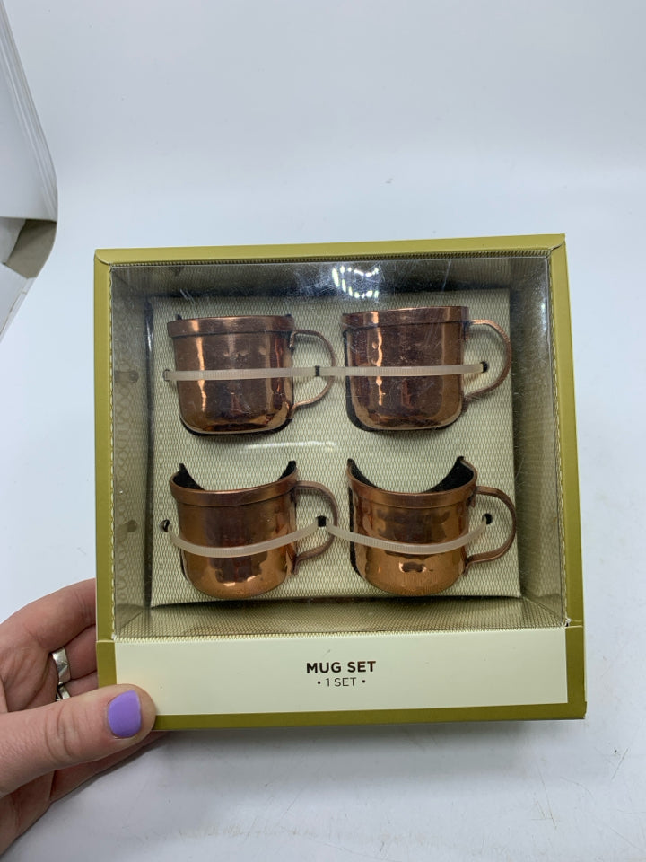 4 NEW MINI COPPER PLATED MUGS.