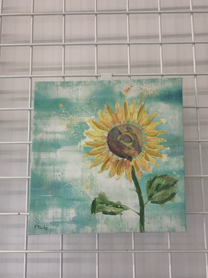 SINGLE SUNFLOWER IN TEAL BACKGROUND CANVAS WALL ART.