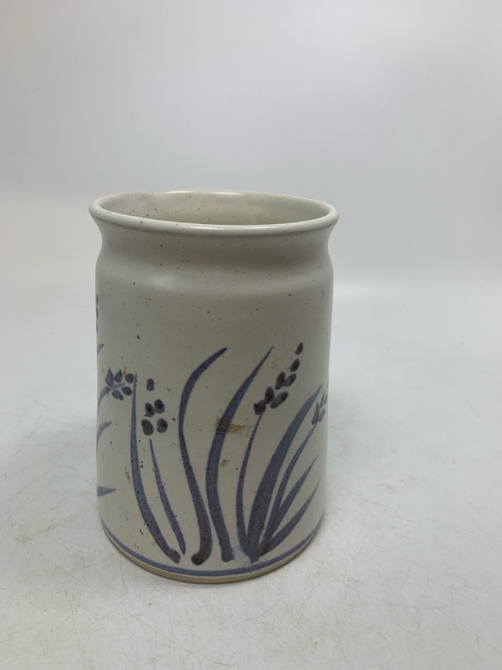 SPECKLED CROCK W/ BLUE PAINTED FLOWERS.