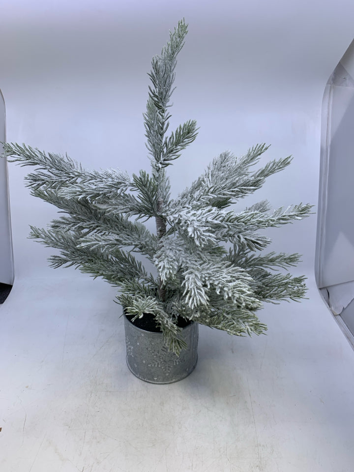 FAUX SNOWY TREE IN METAL SNOWFLAKE PLANTER.