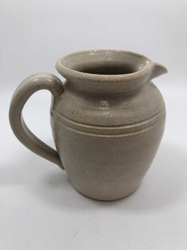 BEIGE PITCHER W/ BLUE HEART STONEWARE.