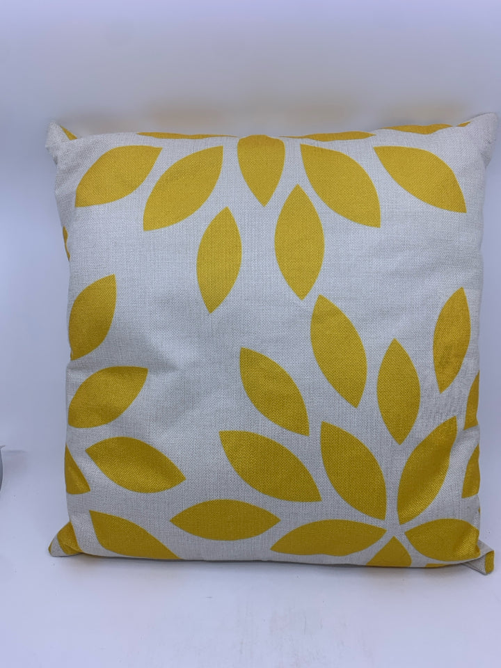 YELLOW FLORAL PATTERN PILLOW.