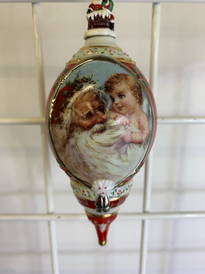 CERAMIC SPIRIT OF CHRISTMAS ORNAMENT.