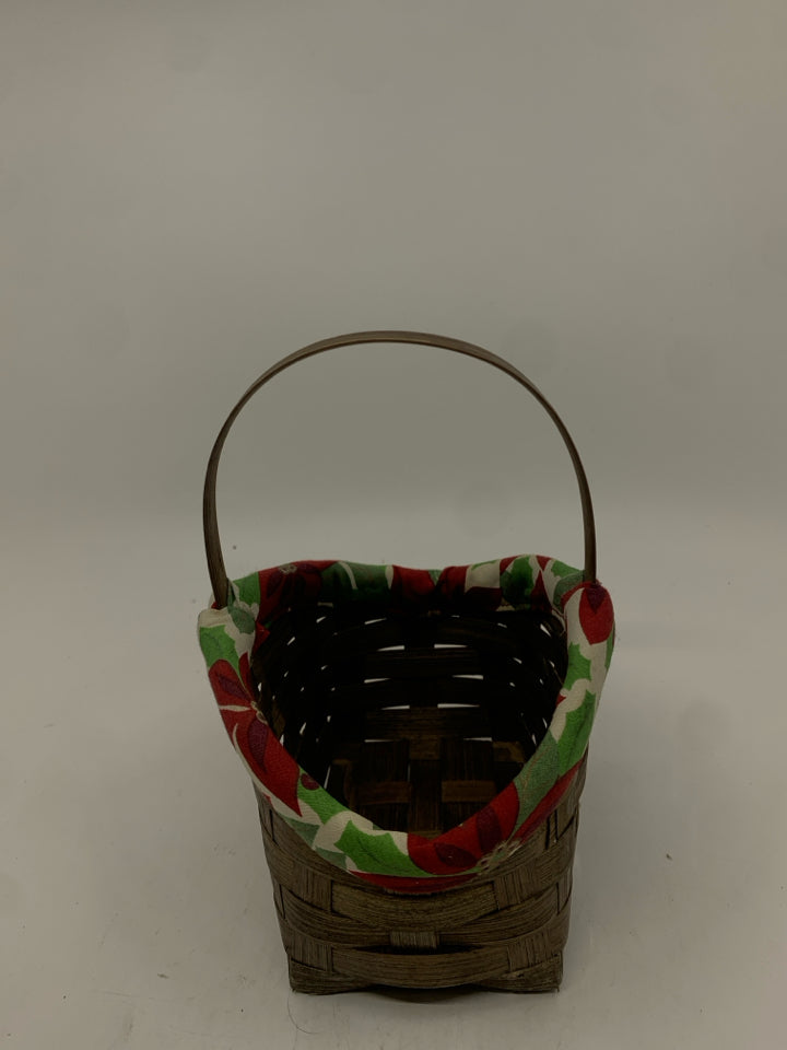 SMALL DARK BASKET W POINSETTIA FABRIC RIM.