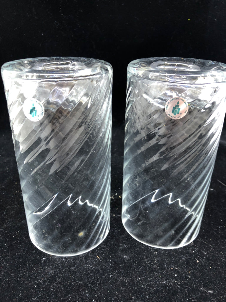 2 SWIRLED CYLINDER CANDLE HOLDERS.