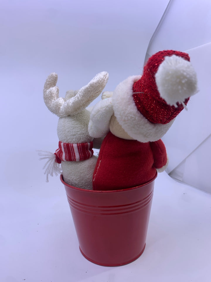 PLUSH SANTA & REINDEER IN RED BUCKET.
