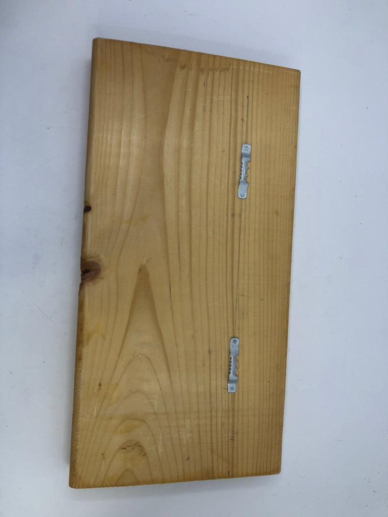 WOOD BLOCK W/ CARVED AM/PM WALL ART.