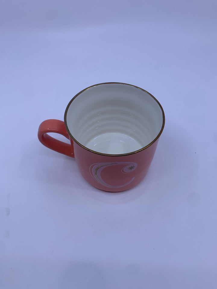 SALMON COLORED MUG W/ GOLD "C".