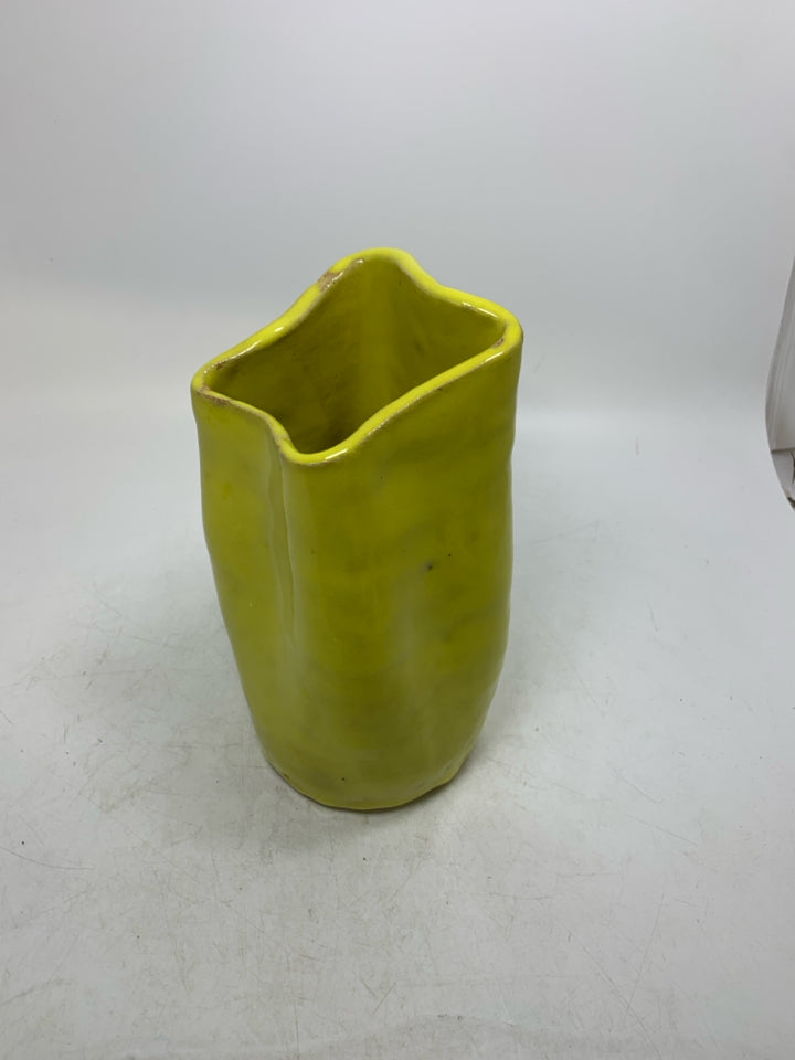 HEAVY UNEVEN POTTERY VASE.