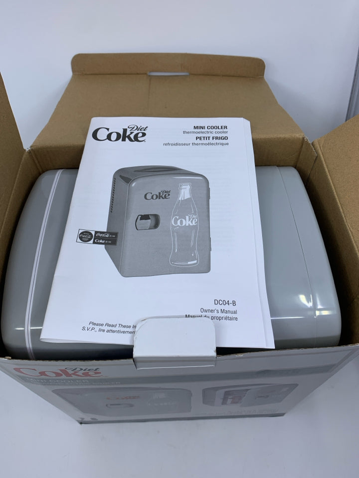 NIB DIET COKE MINI FRIDGE.