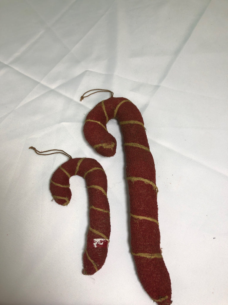 2 PRIMITIVE CANDY CANE.