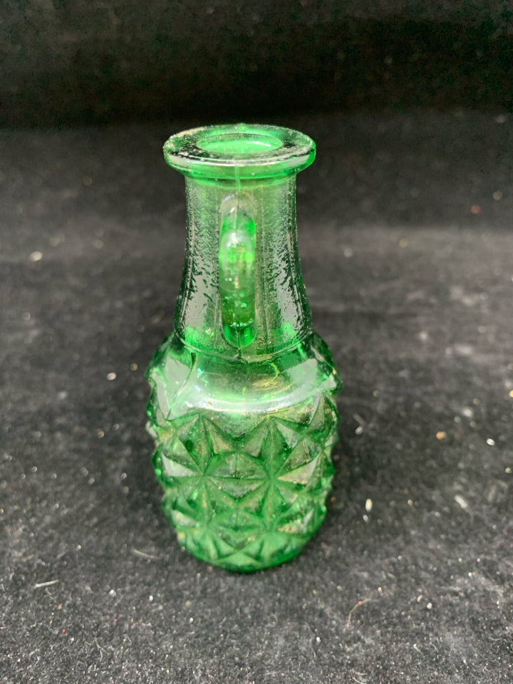 GREEN TEXTURED GLASS EMPTY BOTTLE W HANDLE.