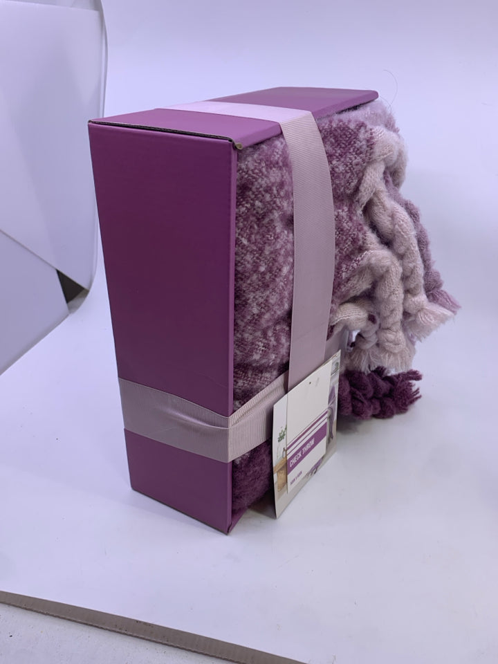 NIB PURPLE THROW CHECK.