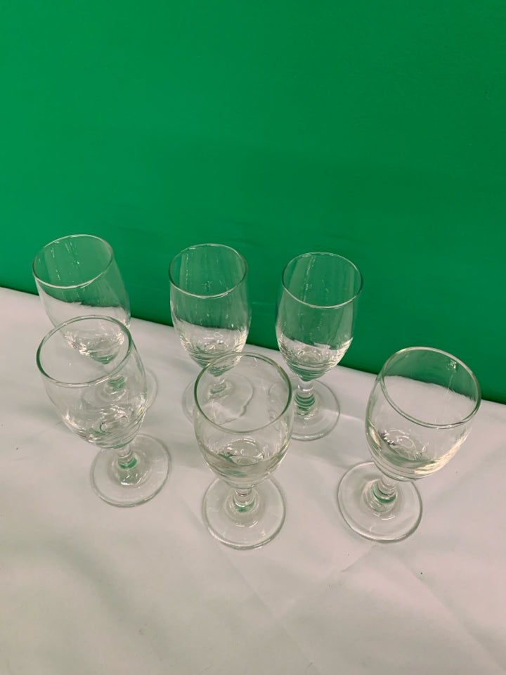 6 SKINNY WINE GLASSES.