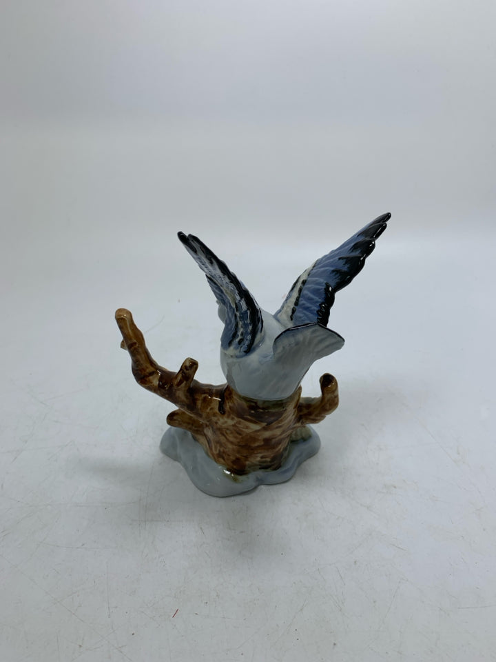 CERAMIC BLUE JAY ON BRANCH.